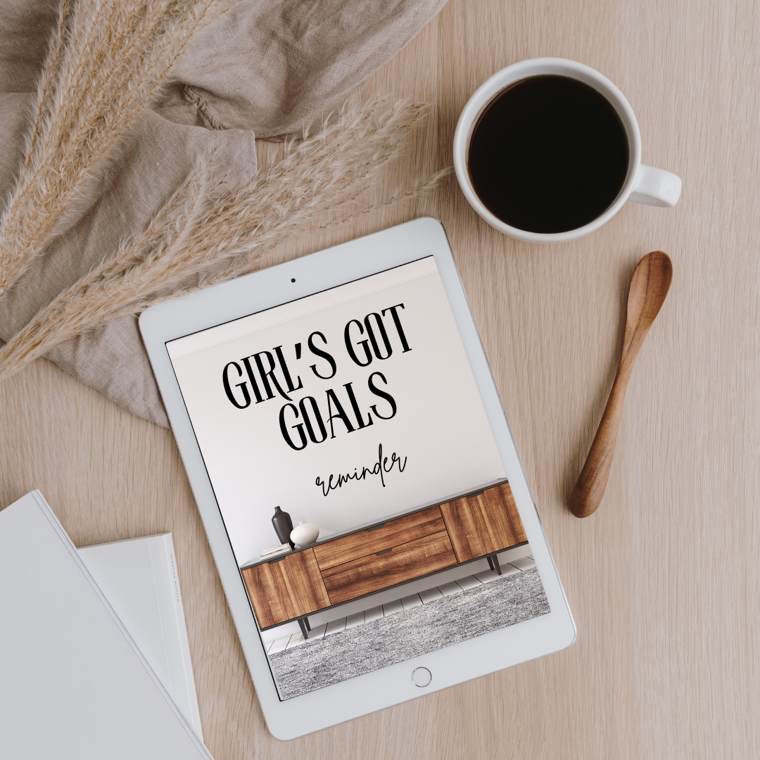 tablet on a table saying girl's got goals